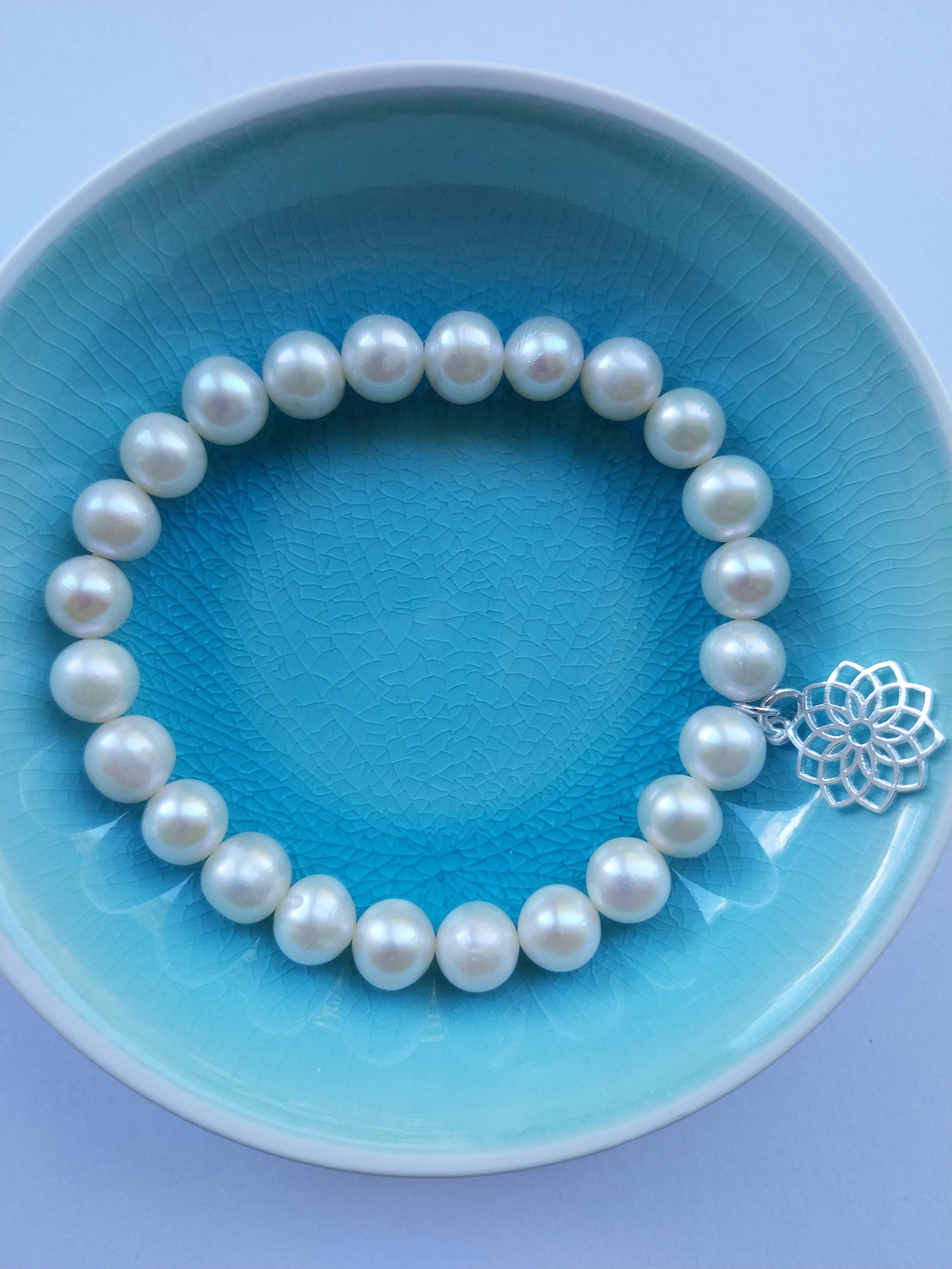 Pearl bracelet with sterling silver crown chakra charm