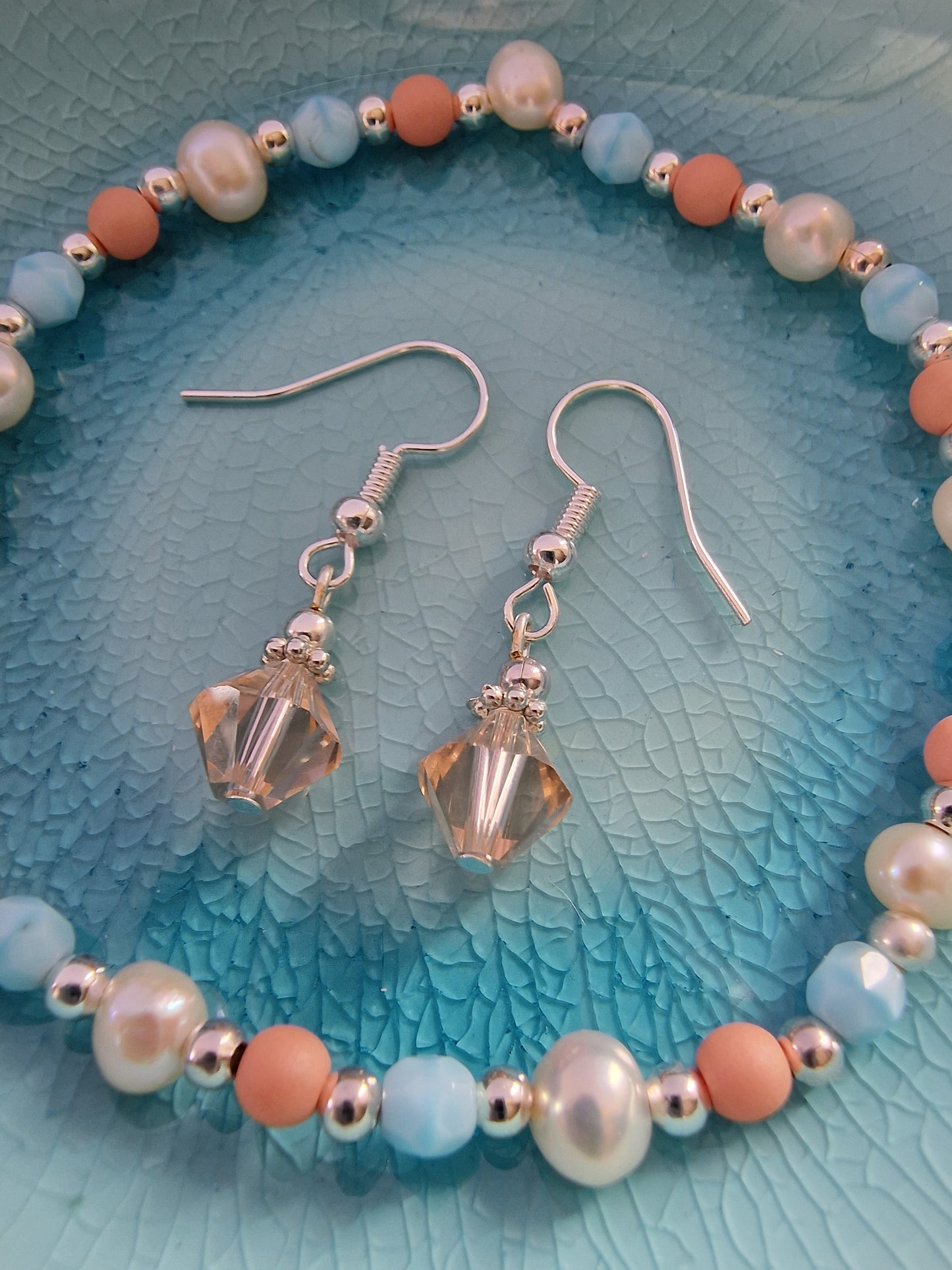 Czech glass bead bracelet in light blue and peach
