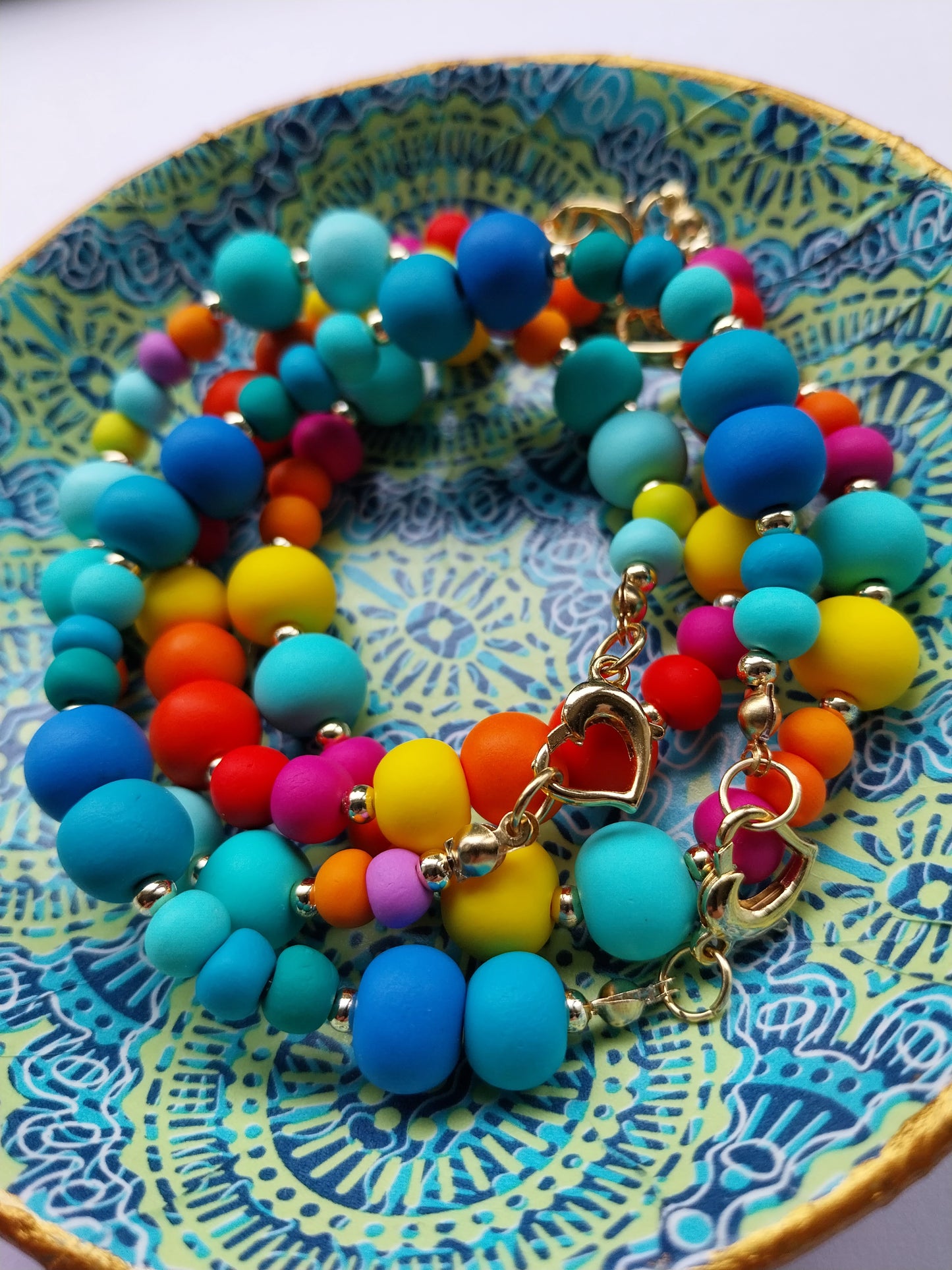 Multi coloured polymer clay bead bracelets with heart clasps