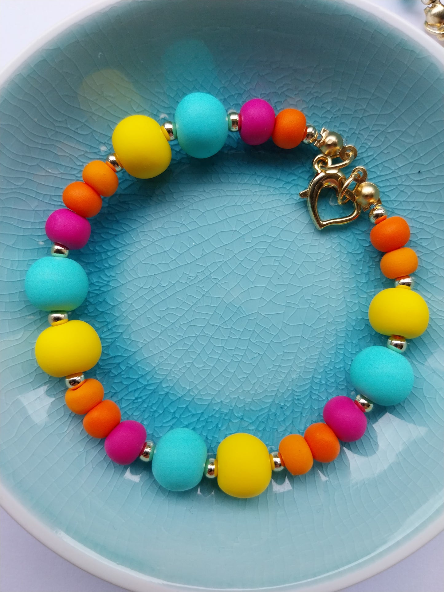 Multi Coloured Polymer Clay bead bracelet with gold plated heart clasp