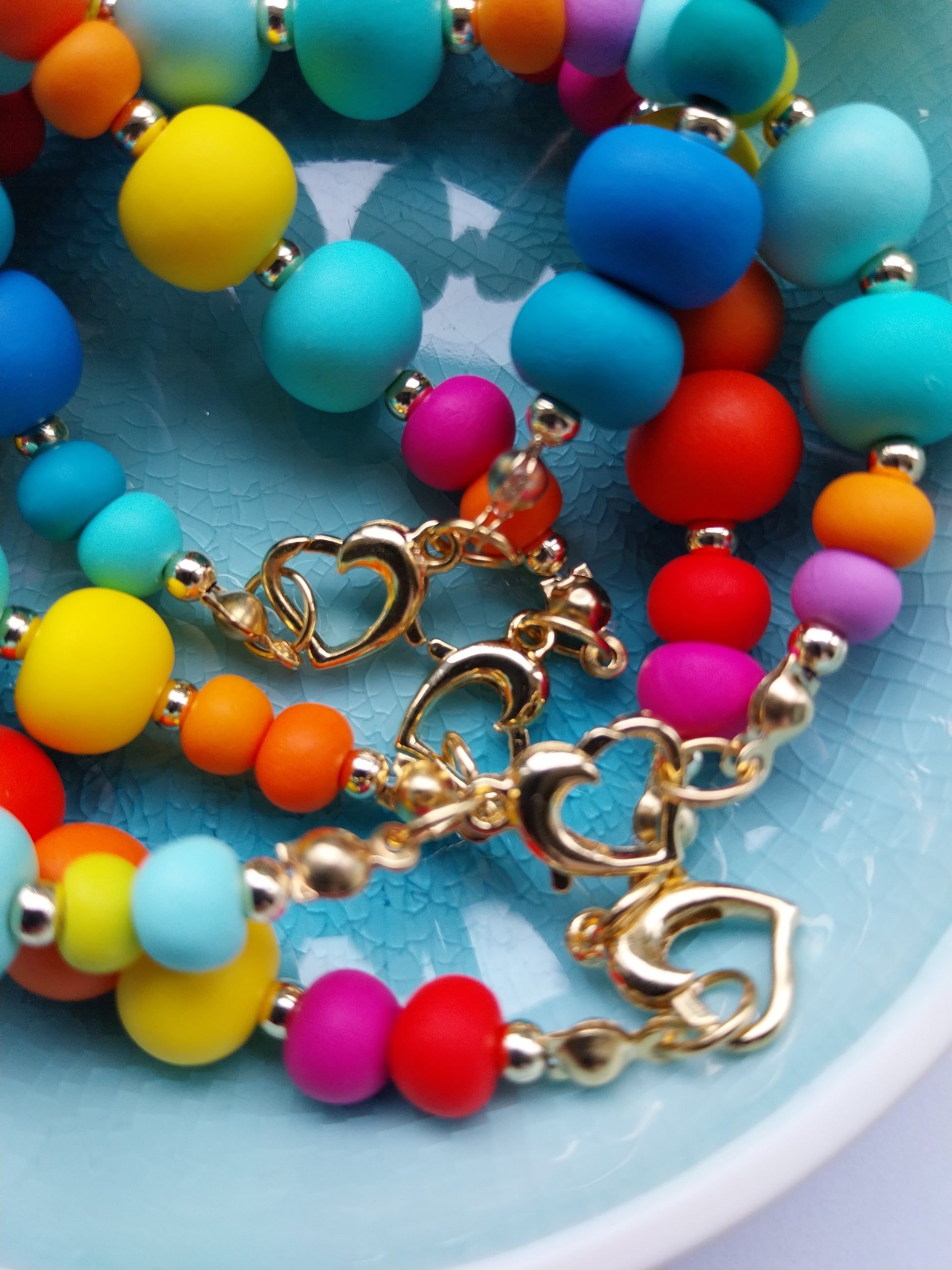 Multi Coloured Polymer Clay bead bracelet with Gold Plated Heart Clasp