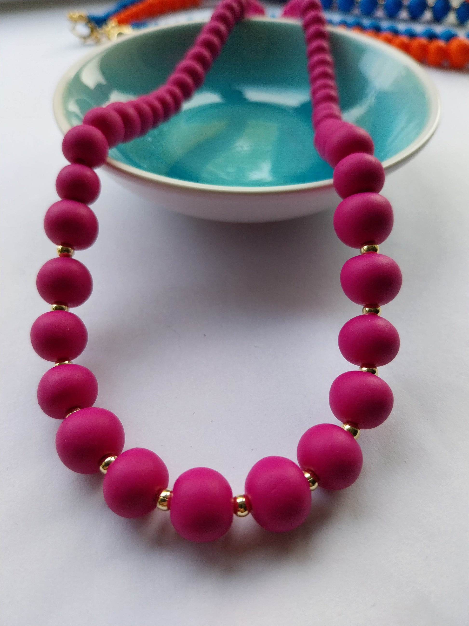 Magenta clay bead necklace