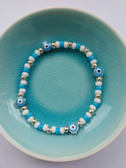 Light Blue & White Bead Evil Eye Pair of Bracelets