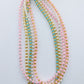 Glass bead necklaces in pastel colours