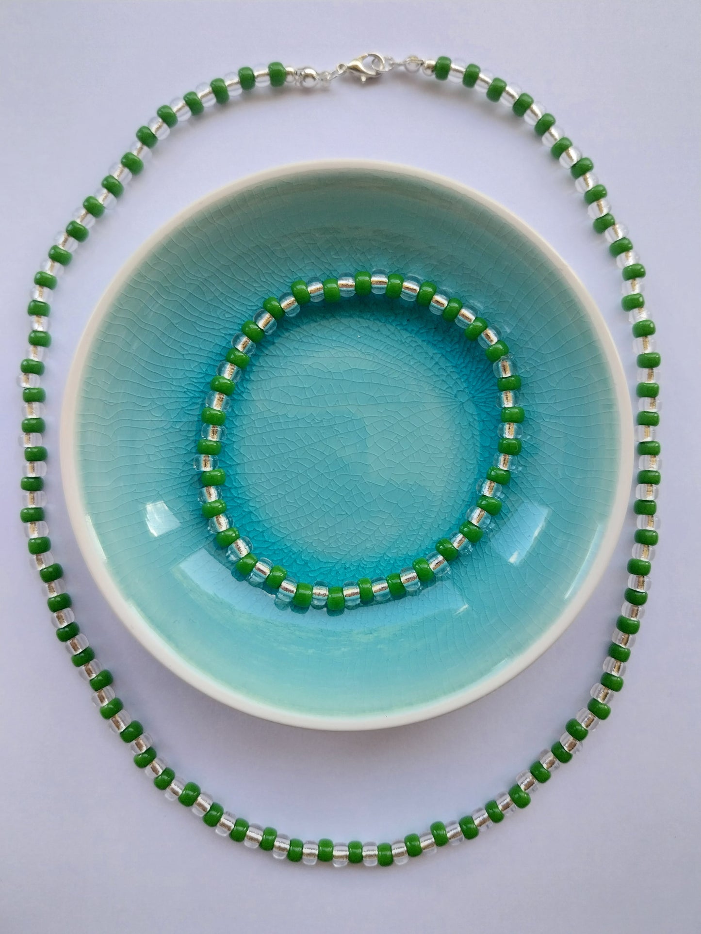 Green and crystal glass bead necklace and matching stretchy bracelet