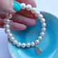 Pearl bracelet with third eye silver chakra charm