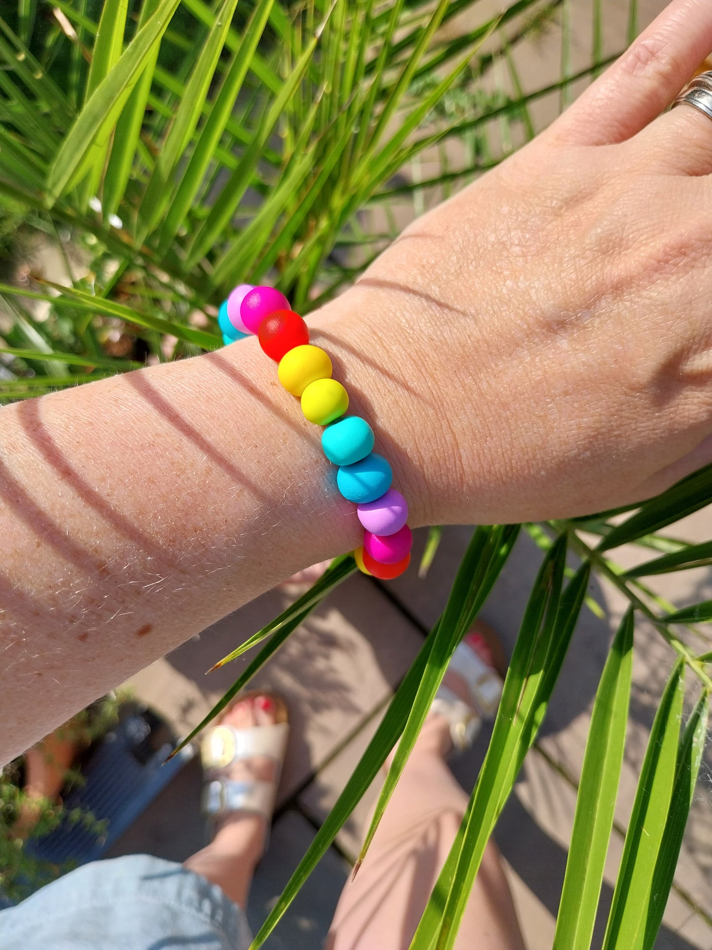 Rainbow coloured elasticated chunky clay bead bracelet