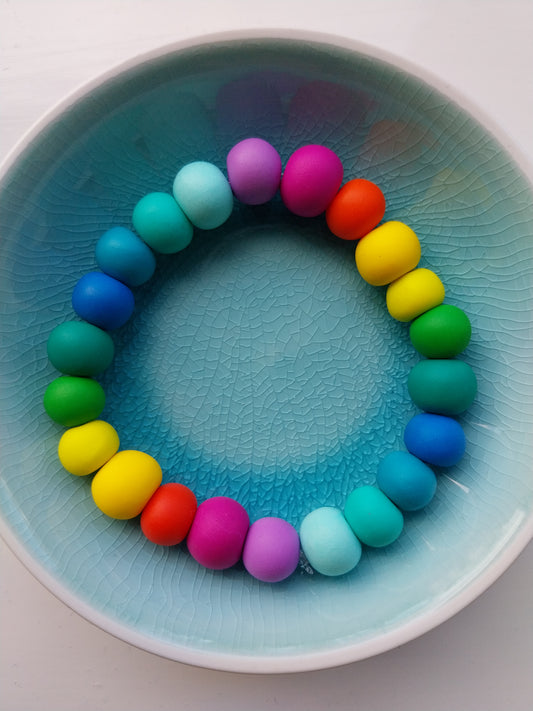 Rainbow colours elasticated clay bead bracelet