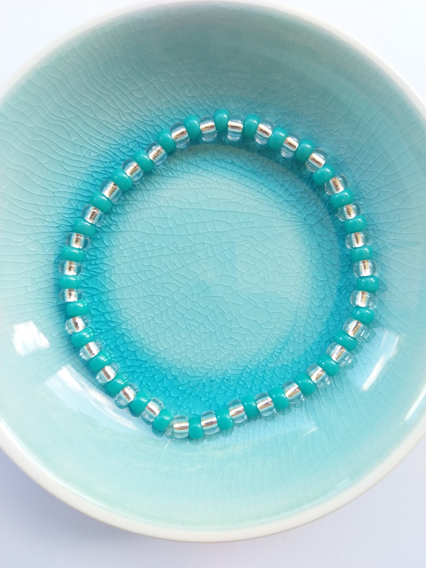 Teal and crystal glass bead elasticated bracelet