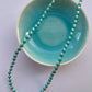 Teal and crystal glass bead necklace