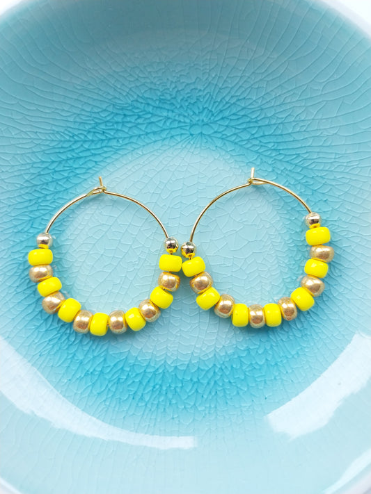 Yellow and gold glass bead hoop earrings