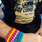 /man wearing unisex bead bracelets in 7 different vibrant colours