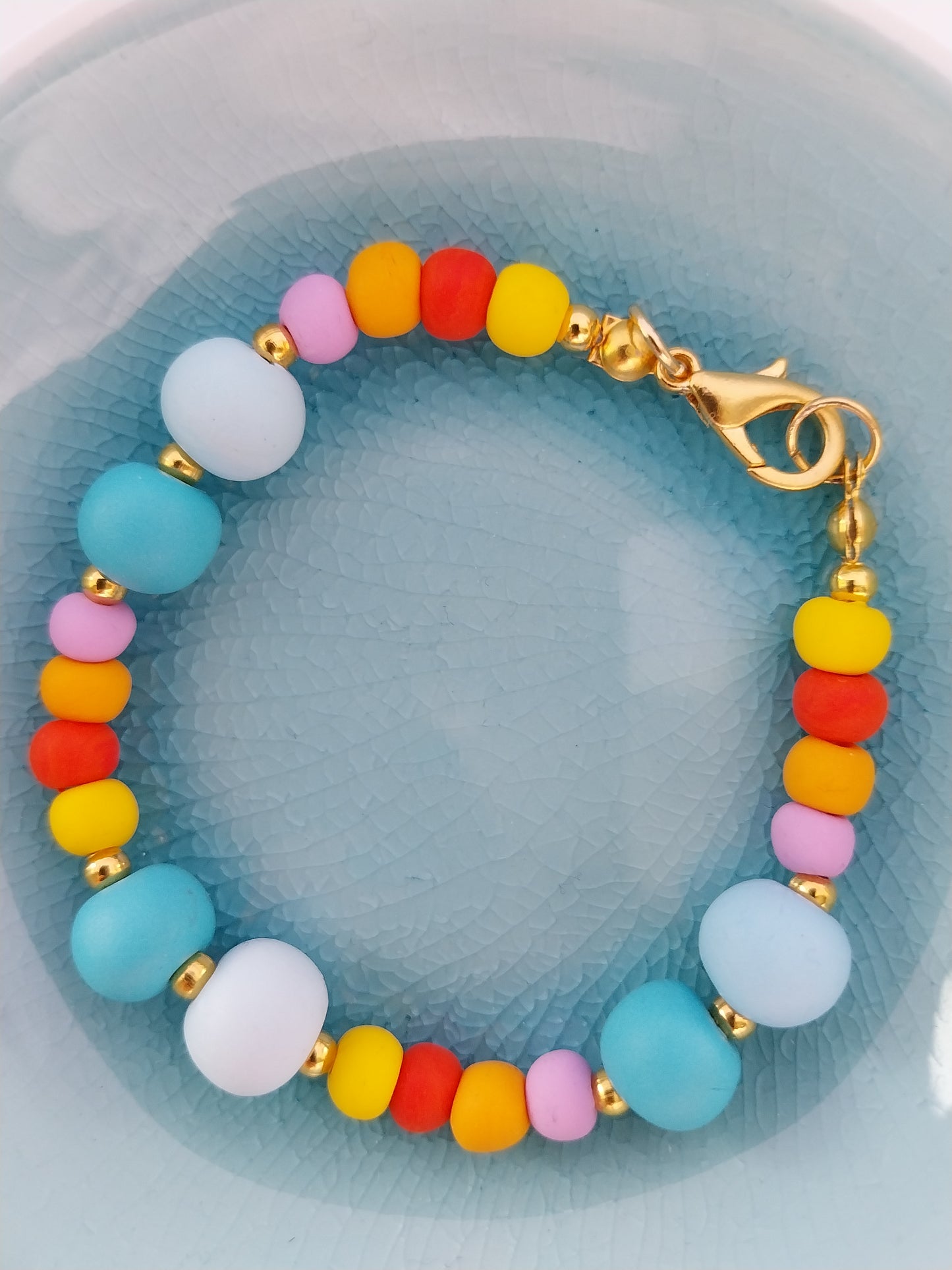 Multi-coloured polymer clay bead bracelet with gold plated findings
