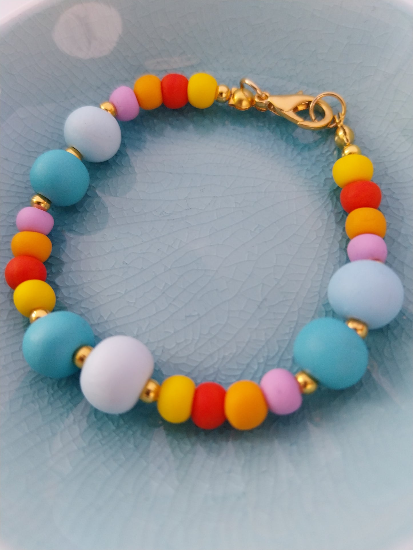 Multi-coloured polymer clay bead bracelet with gold plated findings
