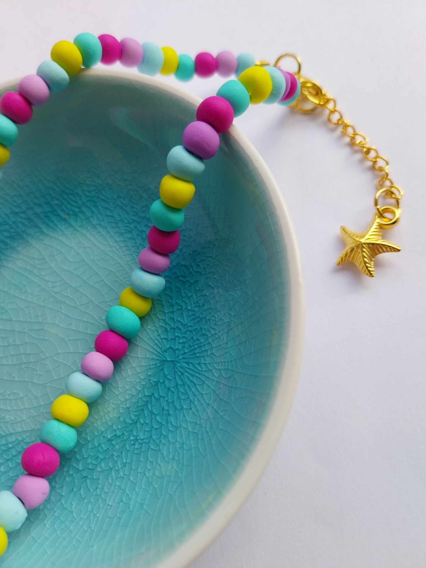 Close up of necklace with starfish charm