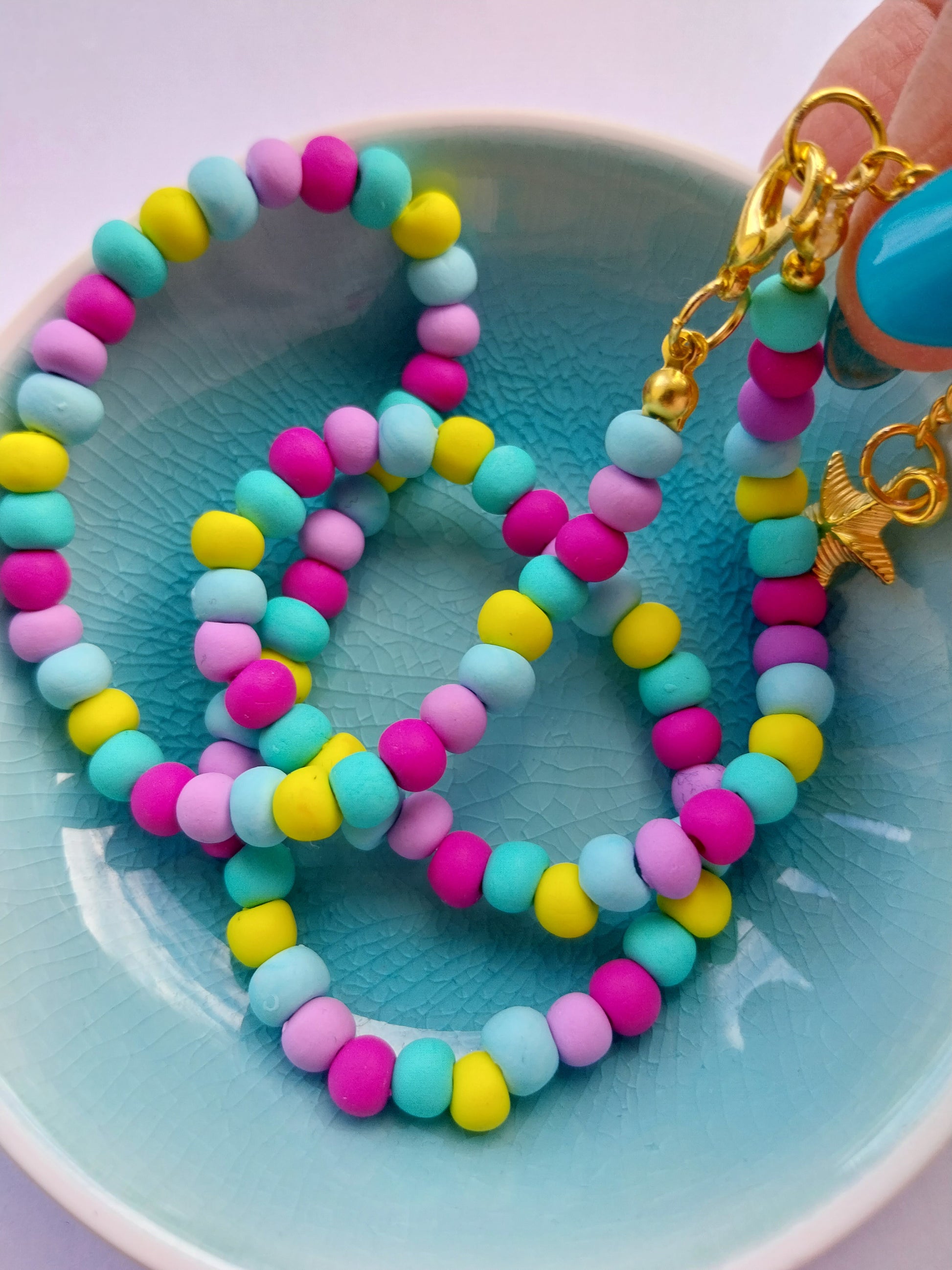 Multi-coloured clay bead necklace with gold plated starfish charm 