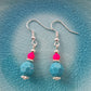 Neon pink and turquoise beaded dangly drop earrings with silver plated ear hooks